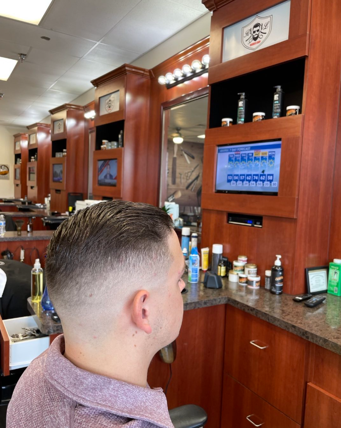 man in barbers chair
