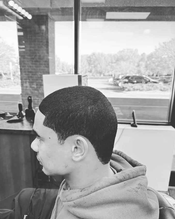 man in barbers chair