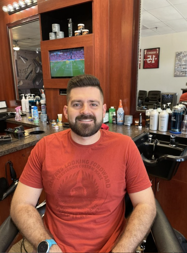 man with beard in barbers chair 
