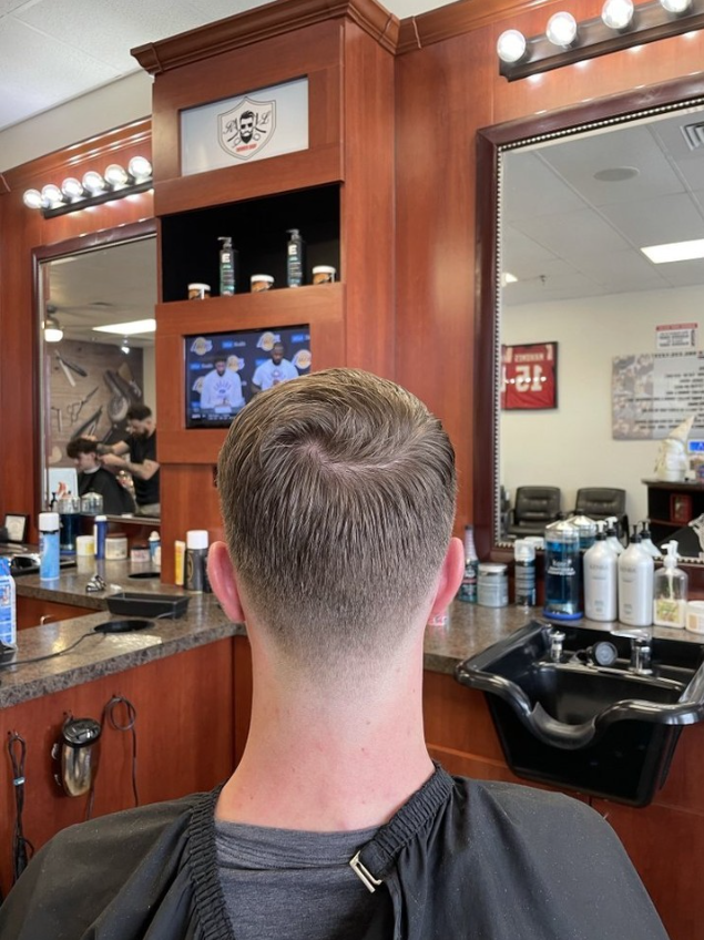 man in barbers chair