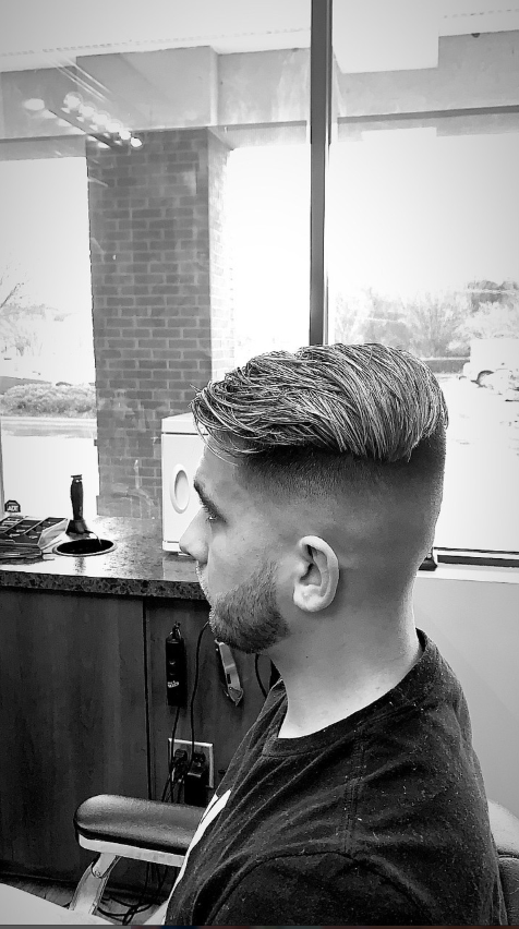 man in barbers chair